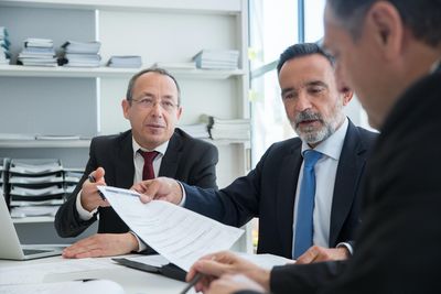 Praetorian Guard advisors in a team meeting